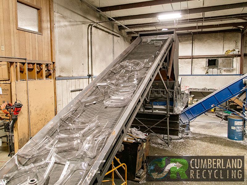 An Industrial Warehouse with a Large Conveyor Belt for Streamlined Waste Management in Franklin, TX
